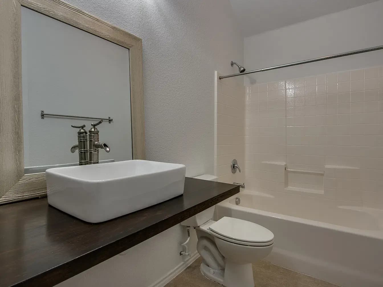 Hall bath with vessel sink and tub